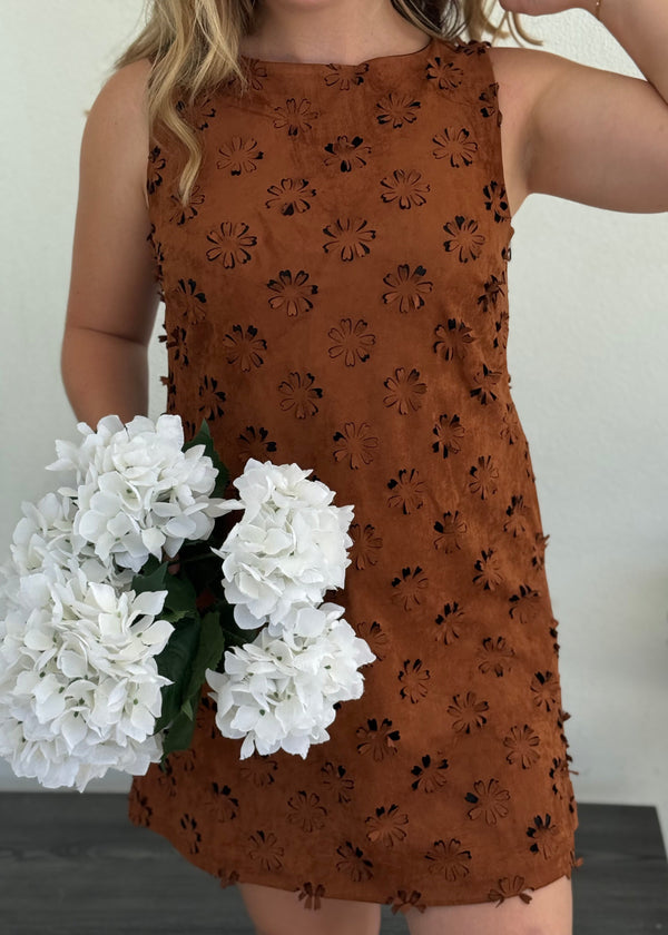 brown dress with floral cut out pattern

